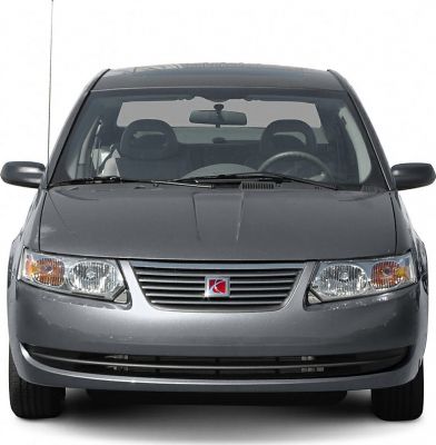 Front view of car featuring grille and headlights