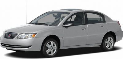 Silver four-door sedan front side view with alloy wheels