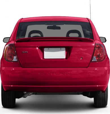 Rear view of a red compact coupe with spoiler and taillights