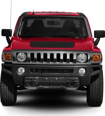 Seven-slot grille and dual round headlights on rugged SUV front.
