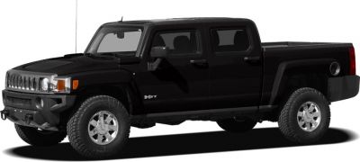 Black pickup truck with off-road tires and a robust body
