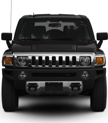 Front view with chrome grille, round headlights, and amber side markers