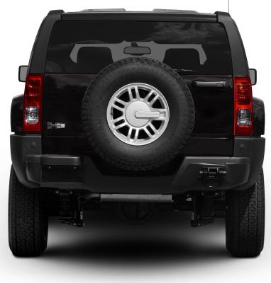 SUV rear with centrally mounted spare tire and prominent tail lights