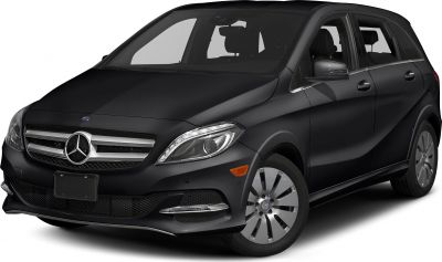 Front side view with sleek headlights and grille