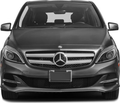 Front view with grille, headlights, and mirrors