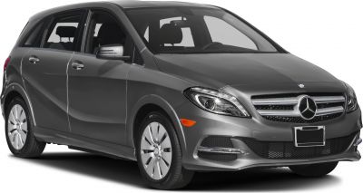 Front-side view with distinct headlights and grille of a compact hatchback.