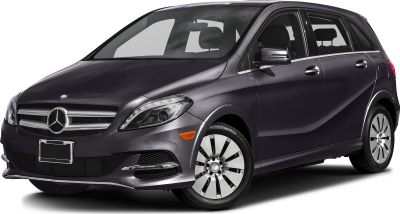 Front side view showing headlights, alloy wheels, and side mirrors