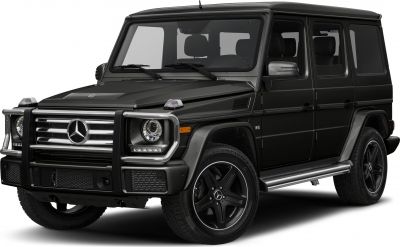 Front view with grille guard, round headlights, and side steps