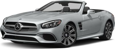 Silver convertible front view with distinctive grille and headlight.