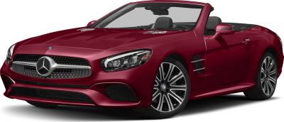 Front-angle view of red convertible with distinctive grille and alloy wheels