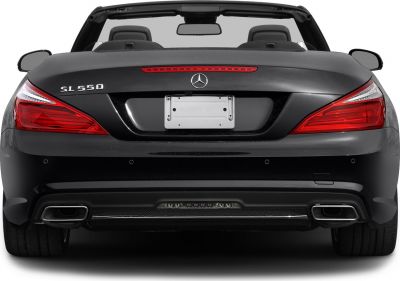 Rear view of convertible with dual exhausts and distinctive LED taillights