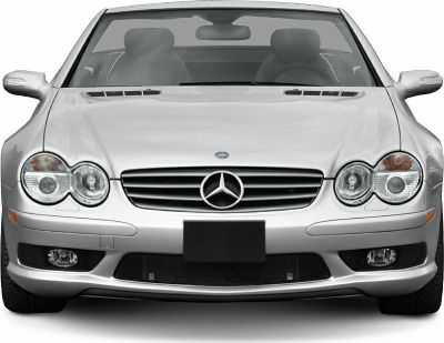 Front view with dual round headlights and signature grille in silver.