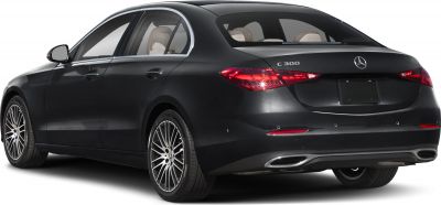 Rear side view of a sleek black sedan with alloy wheels and distinctive taillights