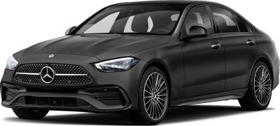 Front grille with star emblem and alloy wheels of a sleek black sedan