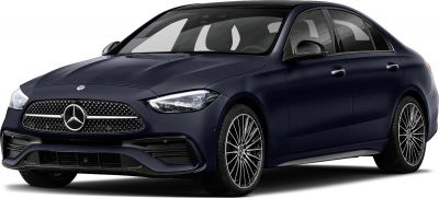 Sleek headlights and detailed front grille of a luxury sedan.