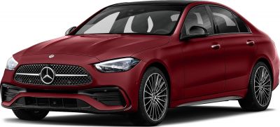 Front three-quarter view of luxury sedan with distinctive grille and alloy wheels.