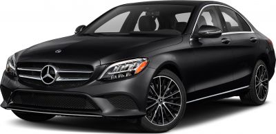 Front grille, headlights, alloy wheel, and side of a luxury sedan