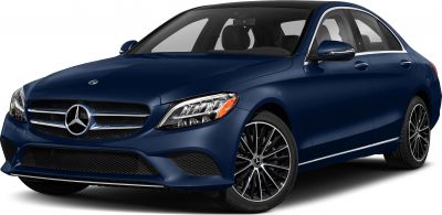 Front view of a luxury sedan with LED headlights and multi-spoke alloy wheels