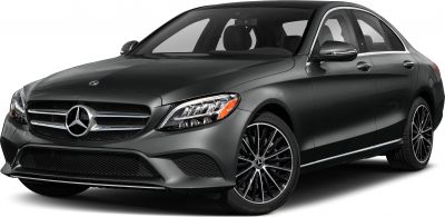 Black compact luxury sedan with multi-spoke wheels in angled front-side view