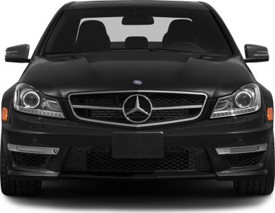 Close-up of car front grille and headlights with integrated daytime running lights.