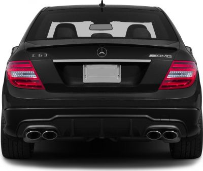 Rear view with AMG badges and quad exhaust