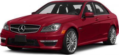 Front and side perspective of a red sedan with distinctive grille and alloy wheels