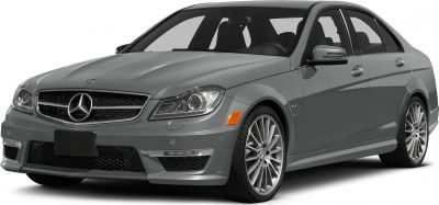 Front view showing headlights and alloy wheels of a luxury sedan.
