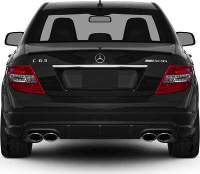 Black high-performance sedan rear with quad exhaust and AMG badge