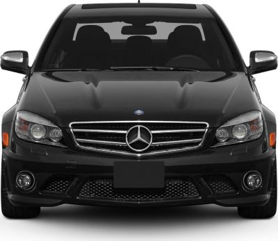 Front view with grille, headlights, fog lights, and side mirrors