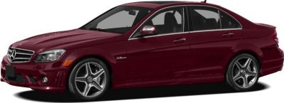 Red luxury sedan with AMG wheels and sleek design