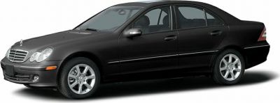 Black sedan side profile with alloy wheels and facelift design