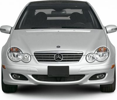 Front fascia with dual round headlights and chrome grille on a sport coupe