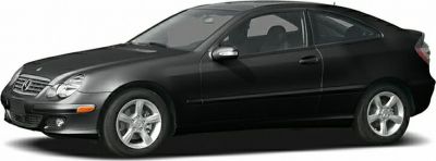 Black 2-door sport coupe with alloy wheels and aerodynamic profile