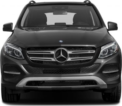 Close-up of front grille and LED headlights of an SUV.