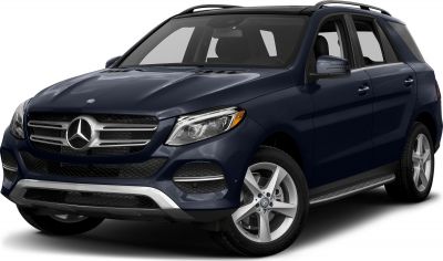 Front side view of an SUV with grille and LED headlights