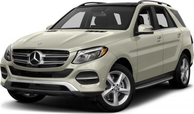 Front low angle view of SUV featuring grille, headlights, and alloy wheels