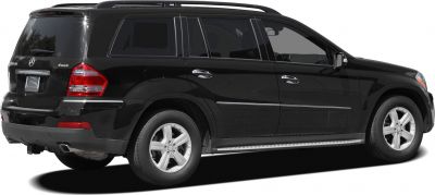 Black luxury SUV rear side with chrome trim and alloy wheels