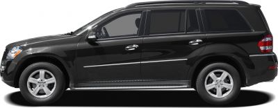 SUV side profile with chrome door handles, roof rails, and alloy wheels