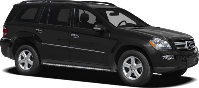 Side view of a black luxury SUV with alloy wheels and chrome trim