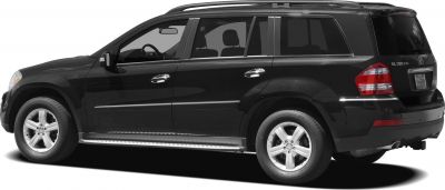 Side profile of large SUV with step board and alloy wheels