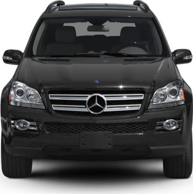 Front view with signature grille and dual headlights of a luxury SUV.