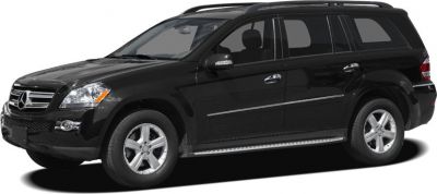 Black SUV with front grille, alloy wheels, and side profile