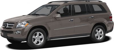 Side and front angle view of SUV with chrome trim and roof rails