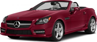 Convertible roadster with front grille, angular headlights, and alloy wheels