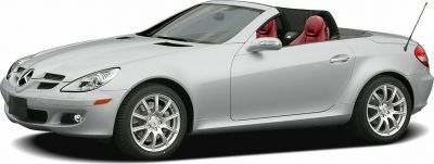 Silver convertible with red leather interior and sporty alloy wheels