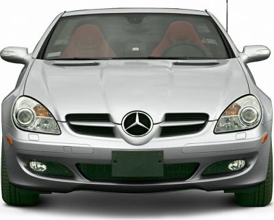 Front view with distinctive grille and headlights