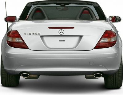 Rear view of convertible with dual exhausts and rear lights.
