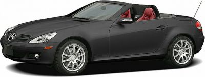 Black convertible roadster with red leather seats and retractable roof