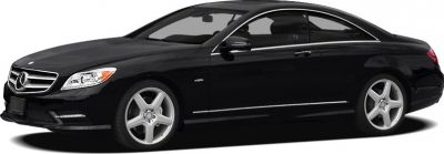 Black luxury coupe side profile with alloy wheels