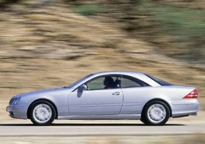 Silver coupe with streamlined side profile and alloy wheels